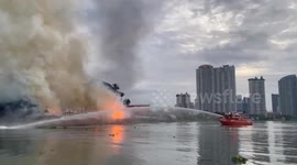 Fire rips through two luxury river cruise boats in Bangkok