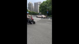 Robot vacuum spotted roaming in pedestrian lane in Zhejiang, China