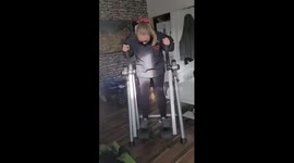 Girl tries exercise equipment but finds herself struggling to keep her balance throughout