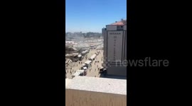 First moments following the Israeli airstrike targeting a vehicle at Al-Saraya junction