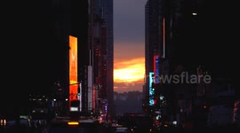US: Crowds gather on 42nd street for cloudy Manhattanhenge