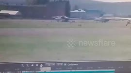 Plane's landing gear collapses sending it skidding along runway on its nose