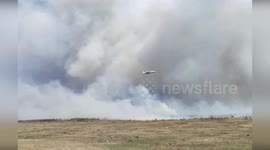 Planes battle wildfires spreading in Siberia
