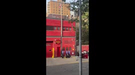 Firehouse prank sees recruits soaked by senior firefighters in New York, USA
