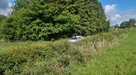 Photographer narrowly escapes as rally car crashes inches away