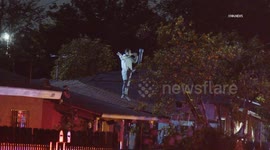 US, Los Angeles: Willowbrook Man On Roof Following Pursuit