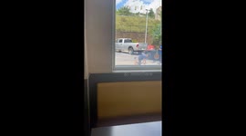 Stumbling Man Dropped During Car Confrontation
