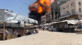 MOMENT - Israel strike residential building in Gaza
