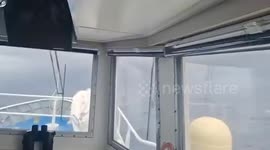 Philippine Coast Guard save fishermen trapped in choppy seas