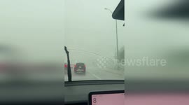 Hailstorm causes flash floods on street in Austin