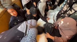 Palestinians killed in Israeli strike on Rafah aid distribution site laid to rest in tearful farewell