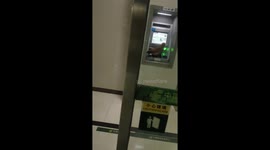 Chicken surprises ATM user in Guangdong, China