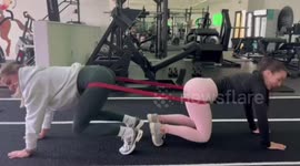 Playful gym moment ends in unexpected rubber band snap in Liverpool, England, UK
