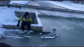 Sledding mishap on broken ice in Moscow, Russia