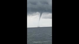 Waterspout tornado seen swirling off the coast of Phuket