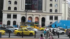 Passersby help to prop up collapsed scaffolding in China