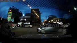 Storm tears down power lines at junction in Thailand