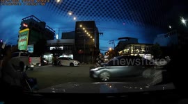 Storm tears down power lines at junction in Thaialnd