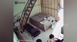 Mother slips down stairs but protects baby from harm