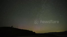 US: TIMELAPSE - Northern lights illuminate night sky in Napa Valley, California