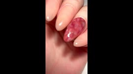 Salami nail art hand painted to look like salami gel polish