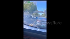 Terrifying moment cars plummet into sinkhole on road in China