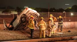 US, Los Angeles: Pacoima Rollover Crash Leads To Armed Suspect Detention