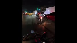 Dashcam captures helmetless rider crashing into truck in Manila, Philippines