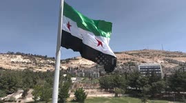 Syria: Massive 600m² Syrian flag raised on country’s tallest 110m flagpole