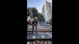Man's train hooking technique fascinates millions