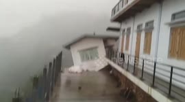 Homes dragged down by landslide in Myanmar