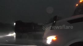 Video of two semi trucks flipped over ON THE I40 during severe thunderstorm in New Mexico, USA