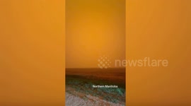 Apocalyptic orange skies as Canada's wildfires rage