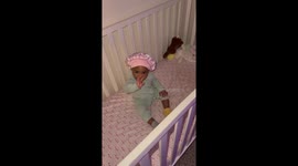 14 month old baby going to bed on her own. She doesn’t need to be rocked or patted.