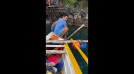 Heavy husband drags rafting guide into the water while being rescued