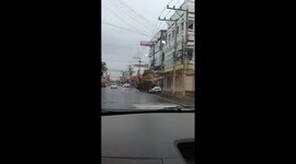 Frog clings to windshield during road trip in Nakhon Ratchasima, Thailand