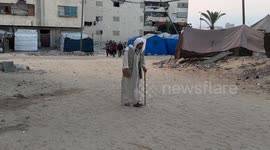 Palestinians perform Eid al-Adha prayers among rubble in Khan Younis