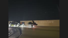 Riding a Jet Ski Down the Highway