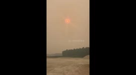 Canada: Wildfires Rage Across Manitoba, Blanketing Skies in Smoke