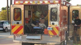US, Los Angeles: Canoga Park Metro Bus Collides With Skateboarder at Busy Intersection