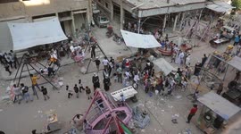 Syria: Children celebrate Eid al-Adha amid ruins of Yarmouk refugee camp in Damascus
