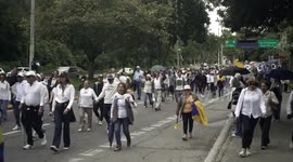 Colombia: Supporters march to hospital praying for injured Columbian presidential candidate