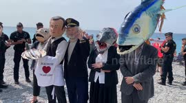 Photos added Ocean Rebellion performers dress up as French President Macron to protest bottom trawling at UN Ocean Conference in Nice, France
