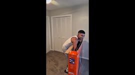 65'' TV slips and breaks during unboxing in Orlando, Florida, USA