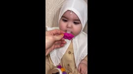 Baby gets pacifier with lips design in Saint Petersburg, Russia