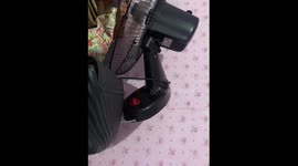 Wall fan moves in reverse in Pasig, Philippines