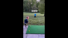 Little boy shows golf skills with perfect shot in London, England