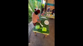 Locals prepare island-themed food spread for guests