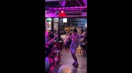 Customer busts awesome dance moves at jazz bar in Chiang Mai