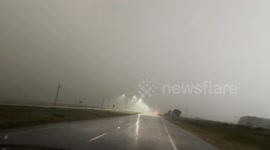 Storm chasers battered by rain as they intercept tornado in northern Texas